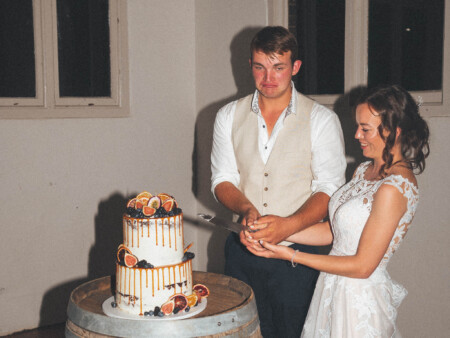 Bride & Groom Cutting Cake at Hunter Valley Wedding